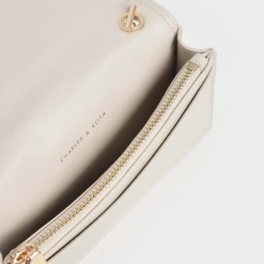 Túi Đeo Chéo Nữ Charles & Keith CNK Quilted Pouch Cream CK6-30680914