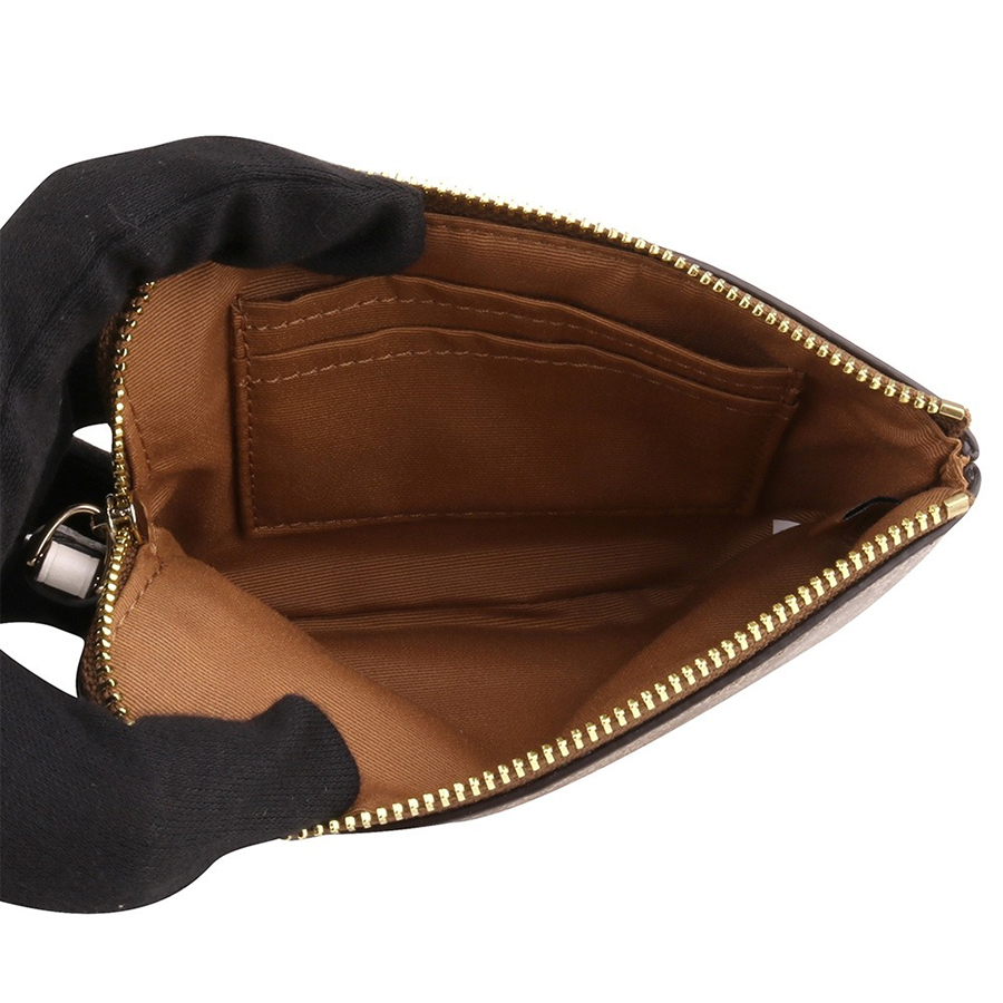 Ví Coach Corner Zip Wristlet In Signature Canvas F58035 Màu Nâu Be