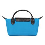 Túi Xách Tay Nữ Longchamp x Toiletpaper Toile Pochette Bleu 34175TPC127 Màu Xanh Blue