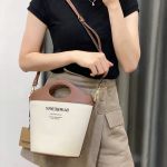 Túi Đeo Chéo Nữ Burberry Pocket Two-tone Canvas and Leather Bucket Bag Màu Nâu Kem