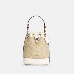 Túi Đeo Chéo Coach Dempsey Drawstring Bucket 15 In Signature Canvas Màu Vàng Nhạt